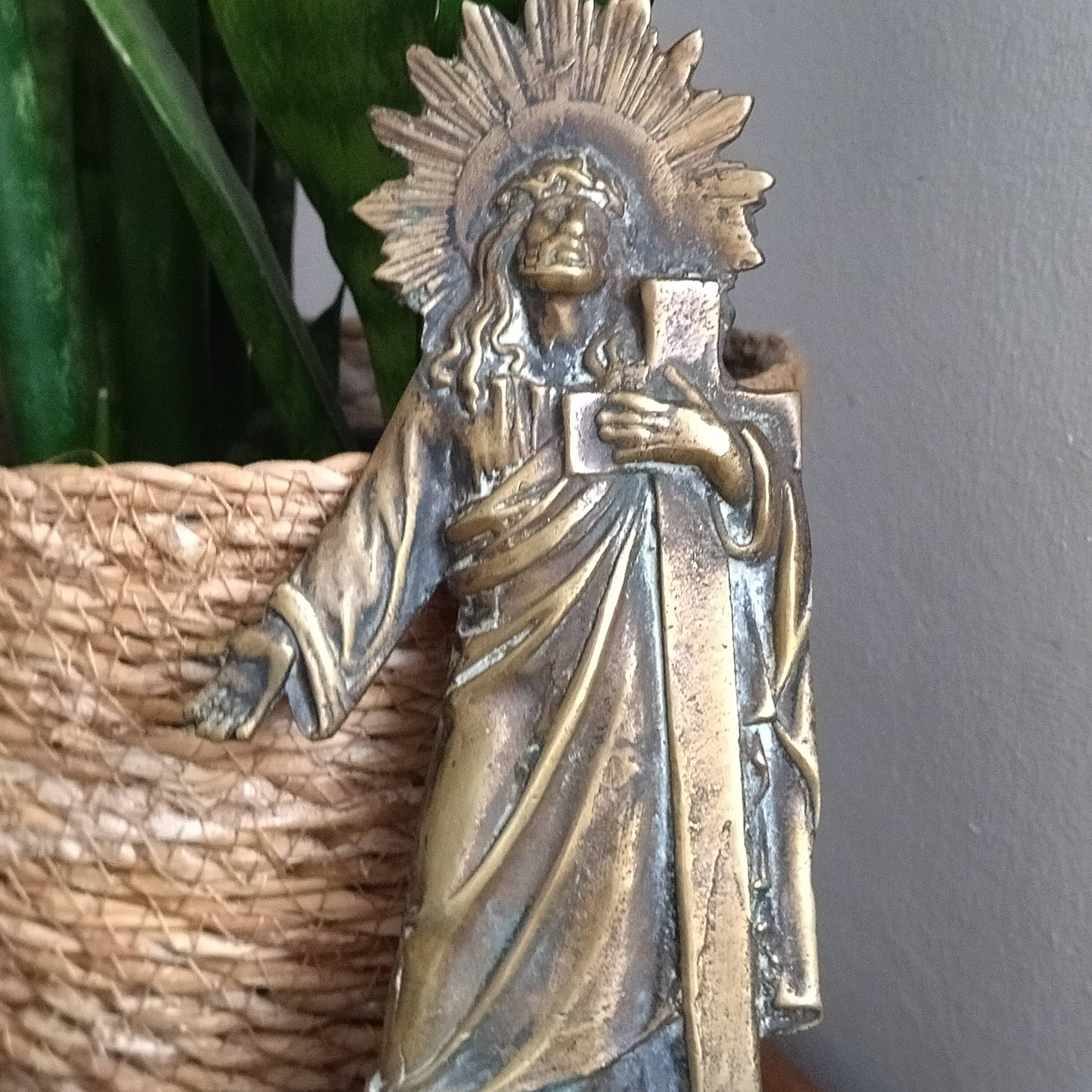 Antique bronze holy water font