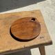Average circular teak monoxyle chopping board with handle 26 x 18.
