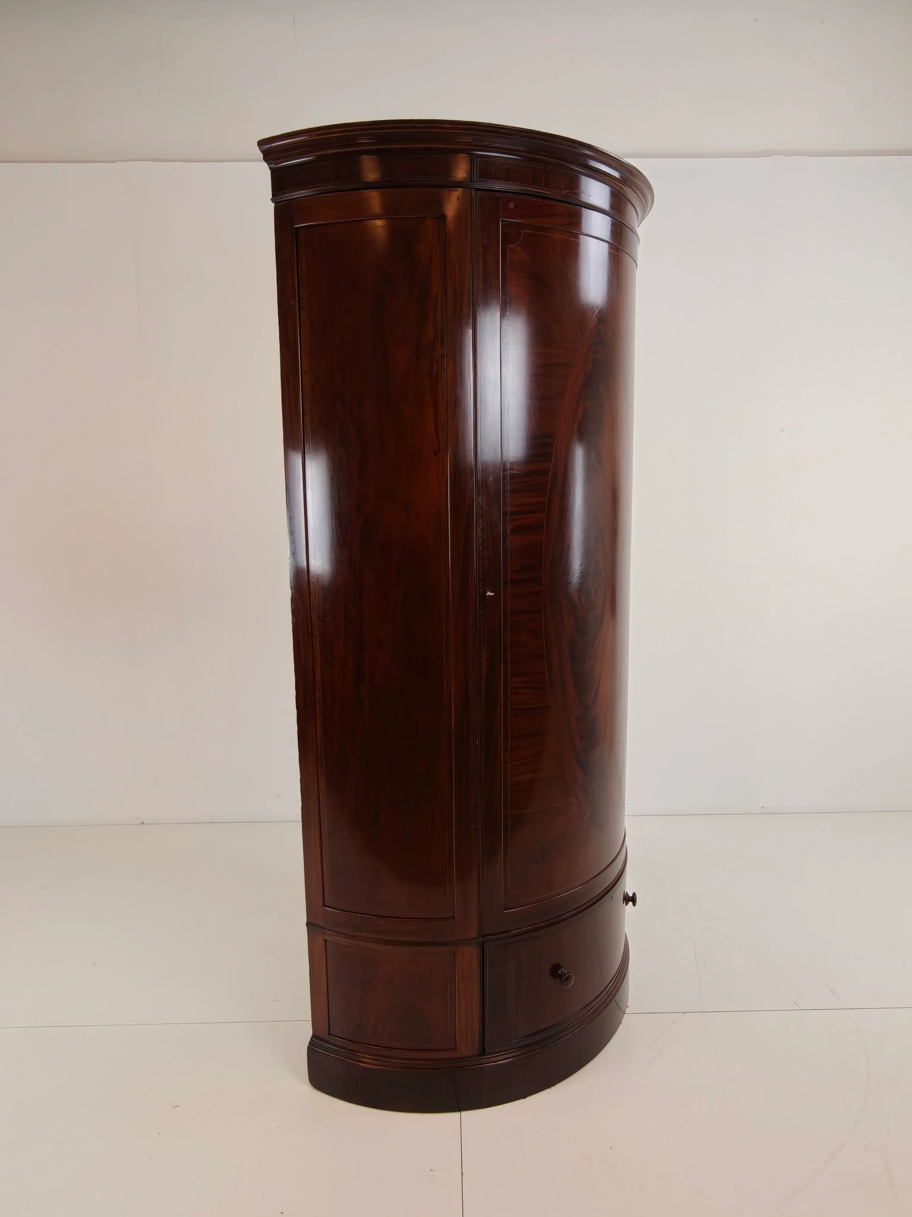 Edwardian mahogany bow-fronted wardrobe by Maple & Co