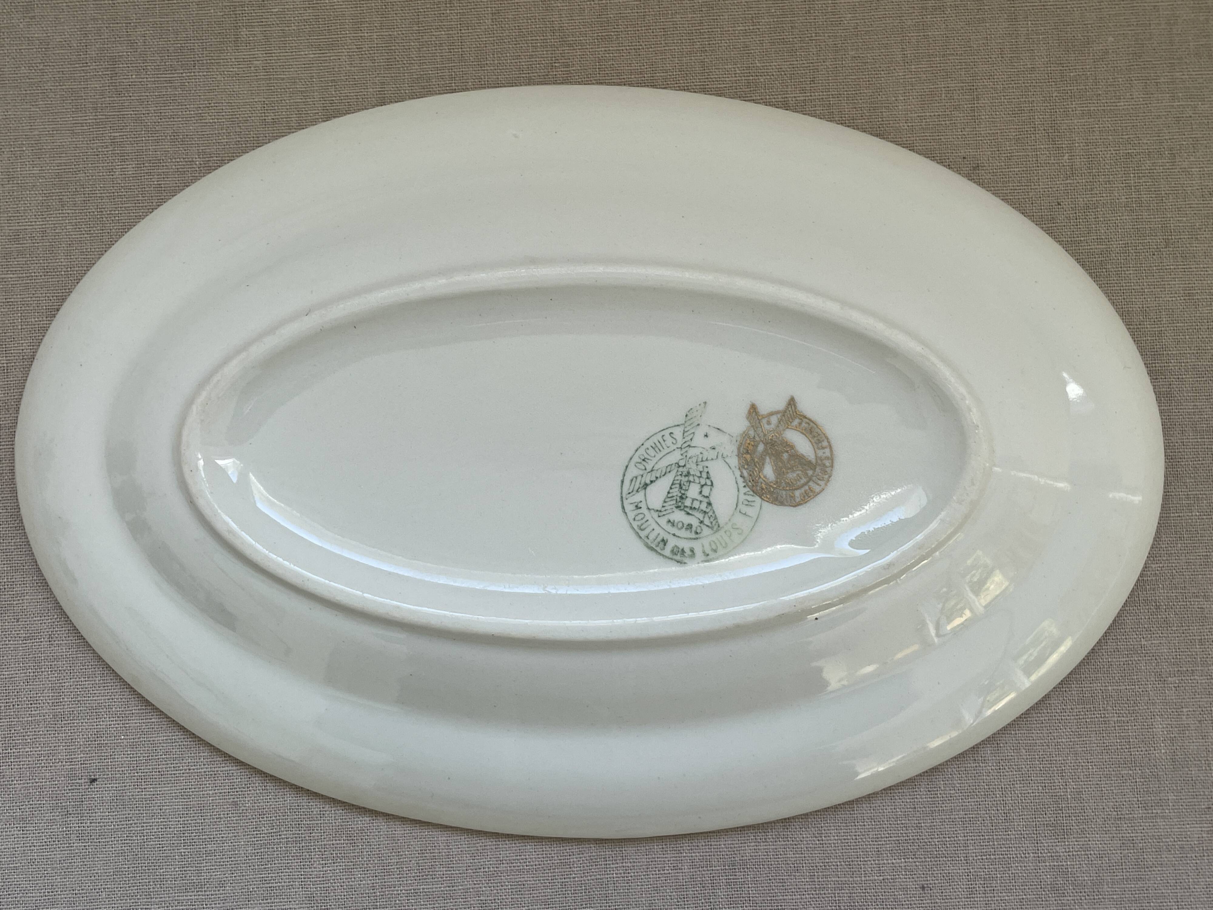 Antique oval plate Moulin des Loups Orchies – grey and gold floral decoration