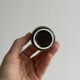 Set of 5 dark brown glazed ceramic egg cups.
