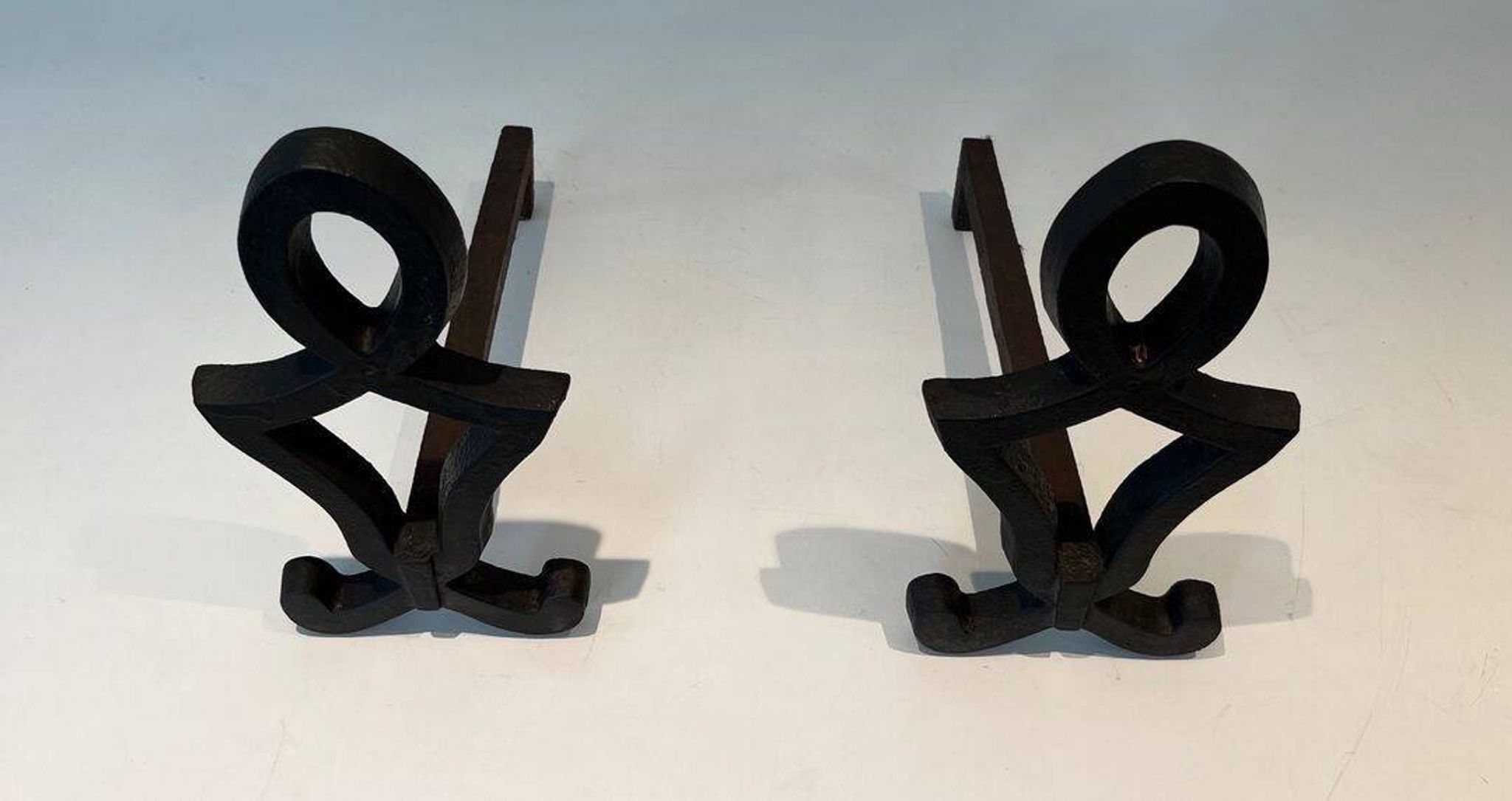 Pair of Cast Iron Chenets with Figurative Anthropomorphic Silhouette, by Raymon