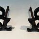 Pair of Cast Iron Chenets with Figurative Anthropomorphic Silhouette, by Raymon