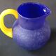 TWO VINTAGE YELLOW AND BLUE GLASS PITCHERS 1990