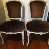 A pair of Louis XV style armchairs in wood and velvet fabrics