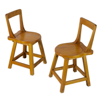 Pair of brutalist wooden back stools. France, circa 1960
