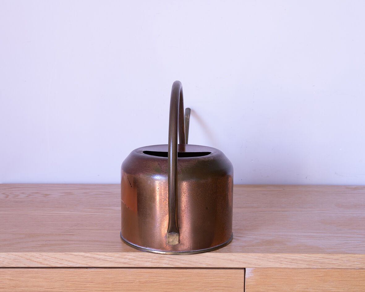 Copper and brass watering can