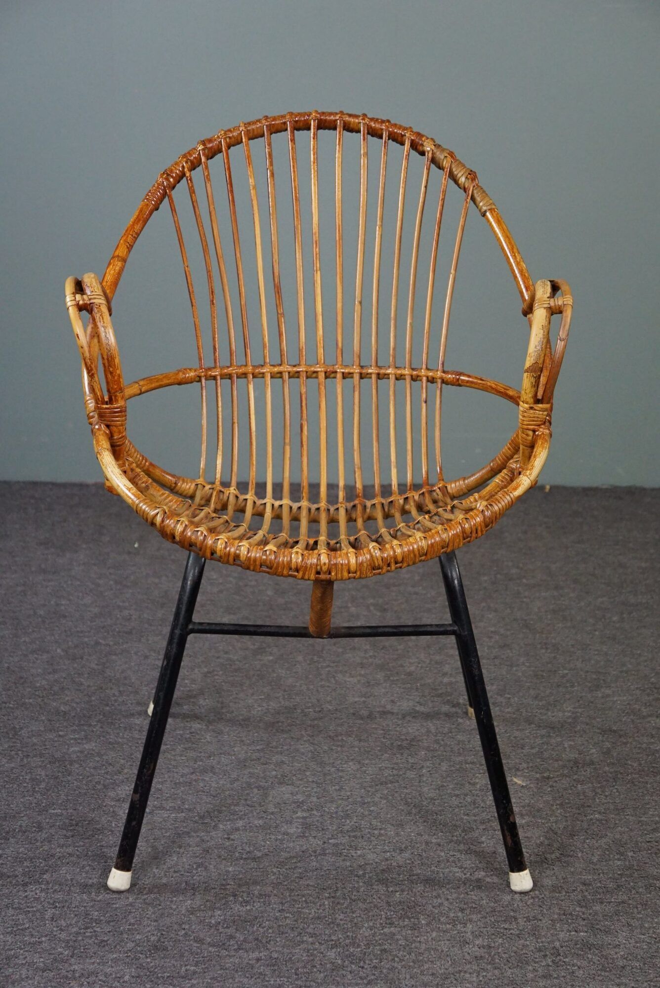 Dark rattan armchair with armrests Dutch Design 1960