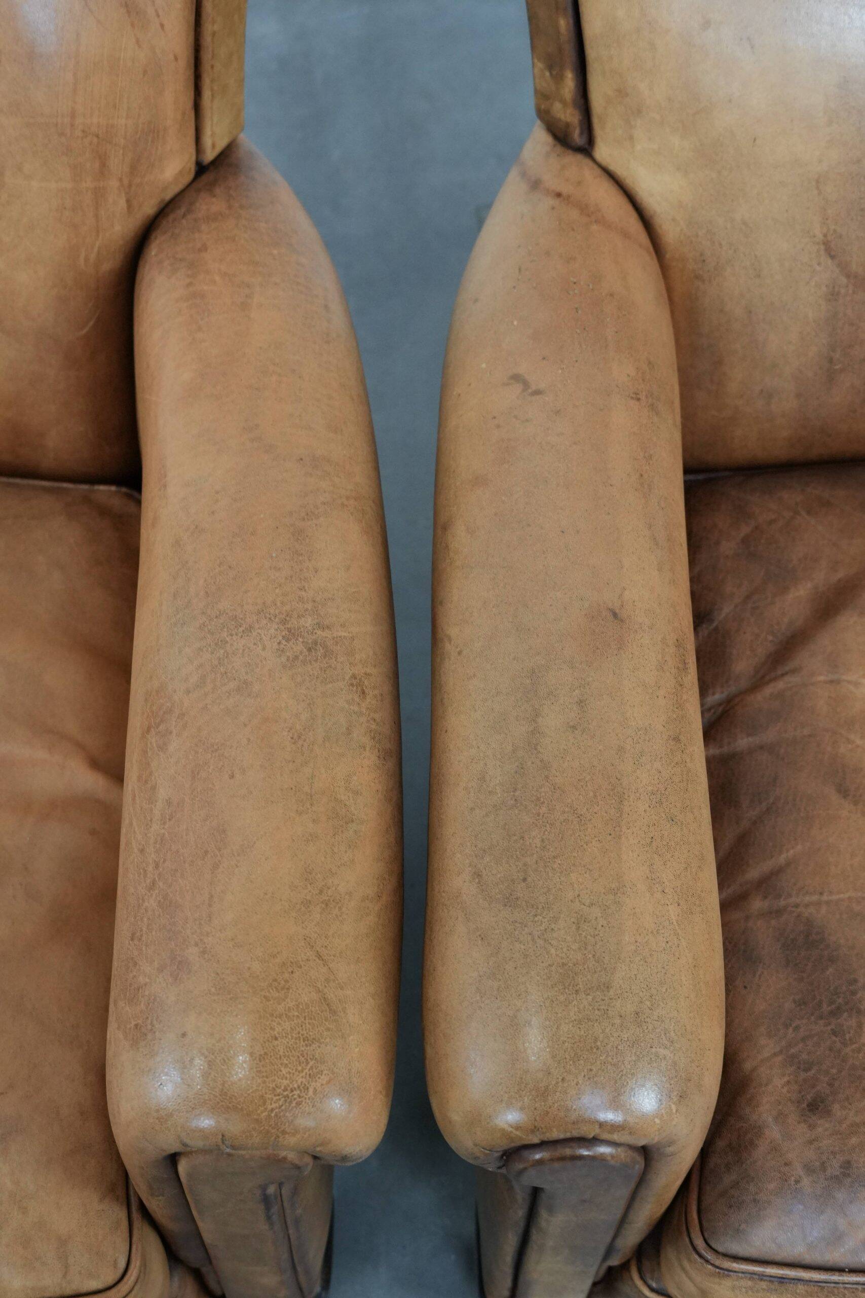 2 fauteuils vintage en cuir de mouton