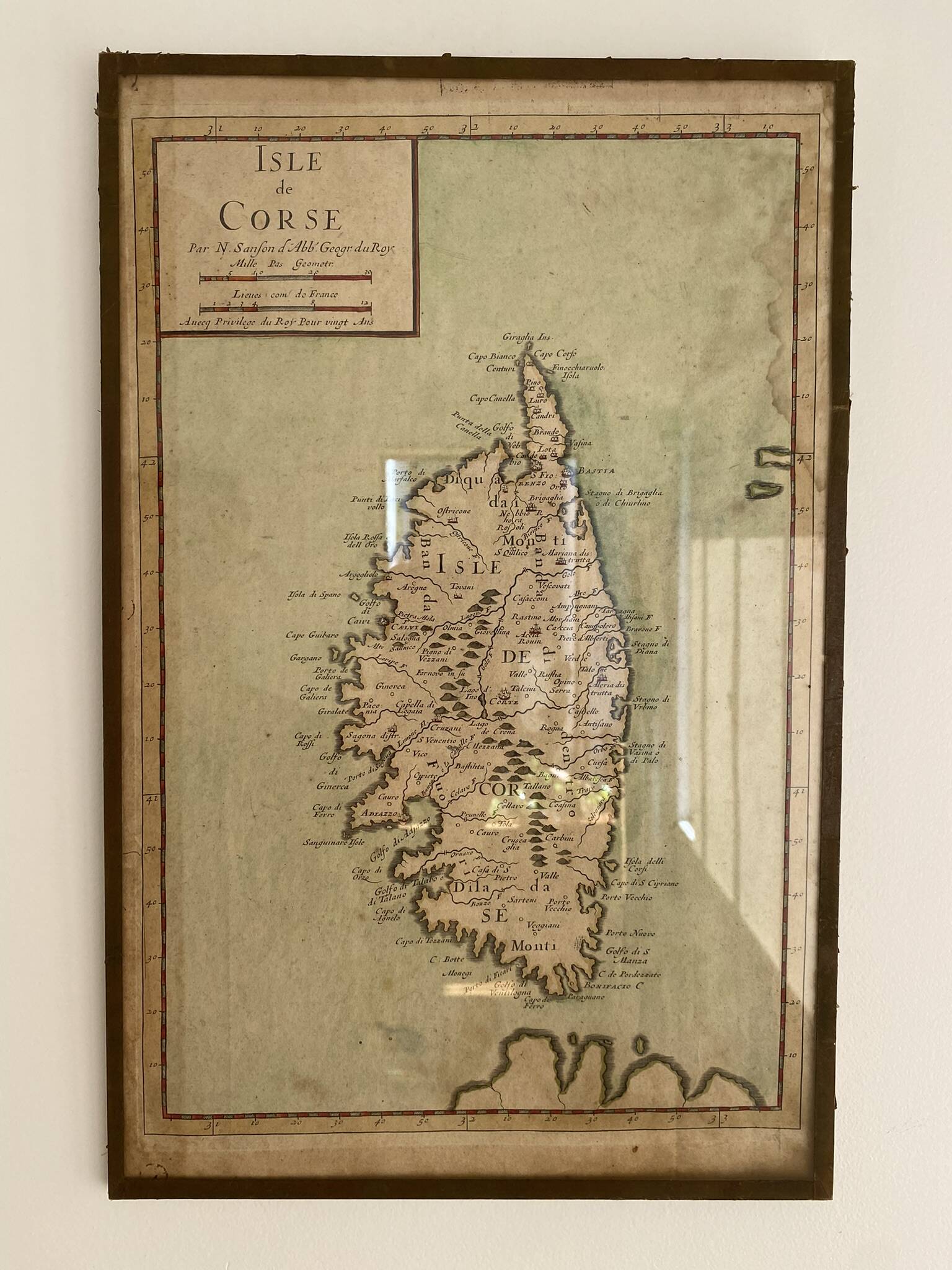 Old map of the Isle of Corsica framed under glass