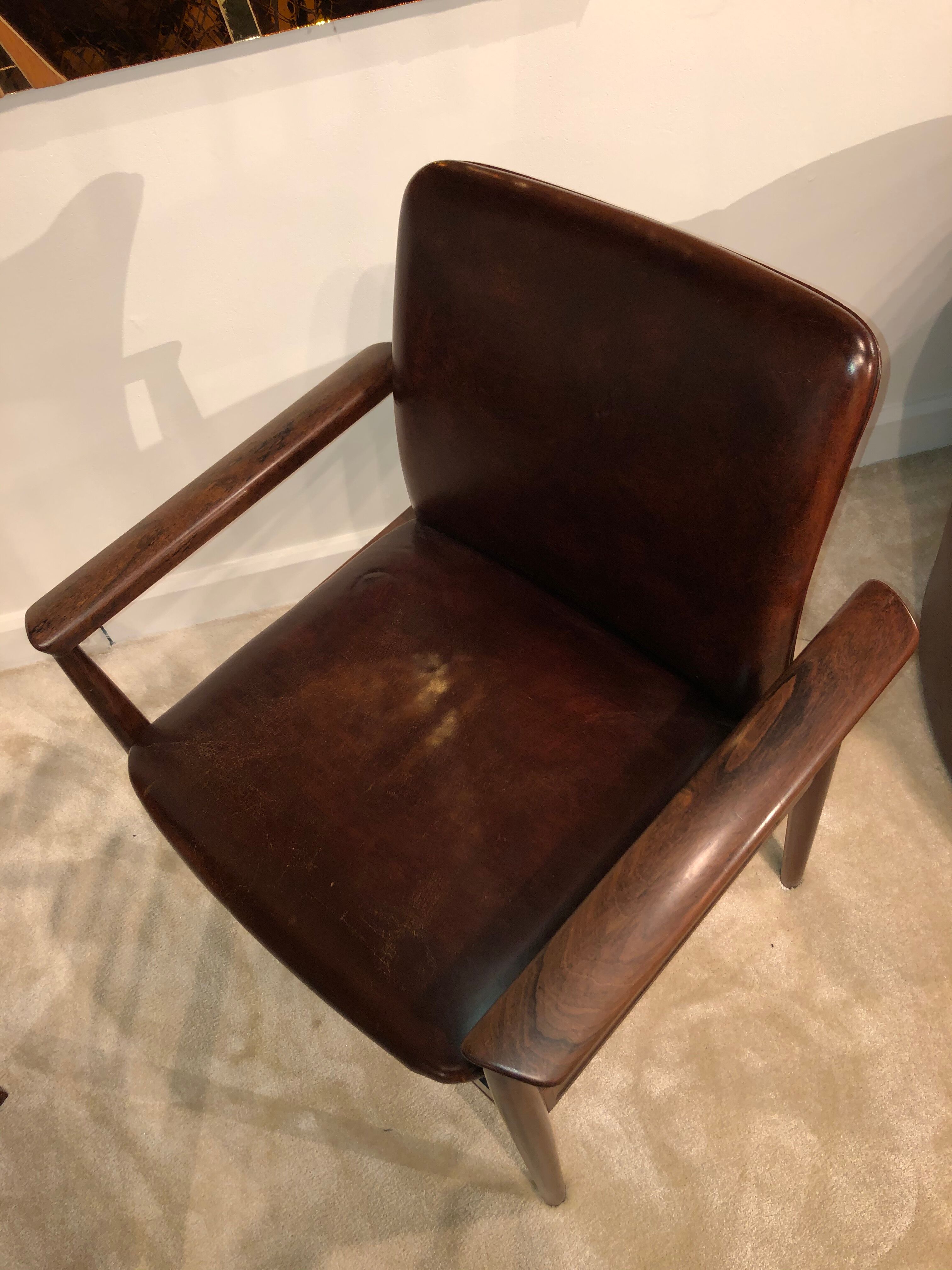 Finn Juhl's "Diplomat" armchair from the 1960s in solid rosewood and leather