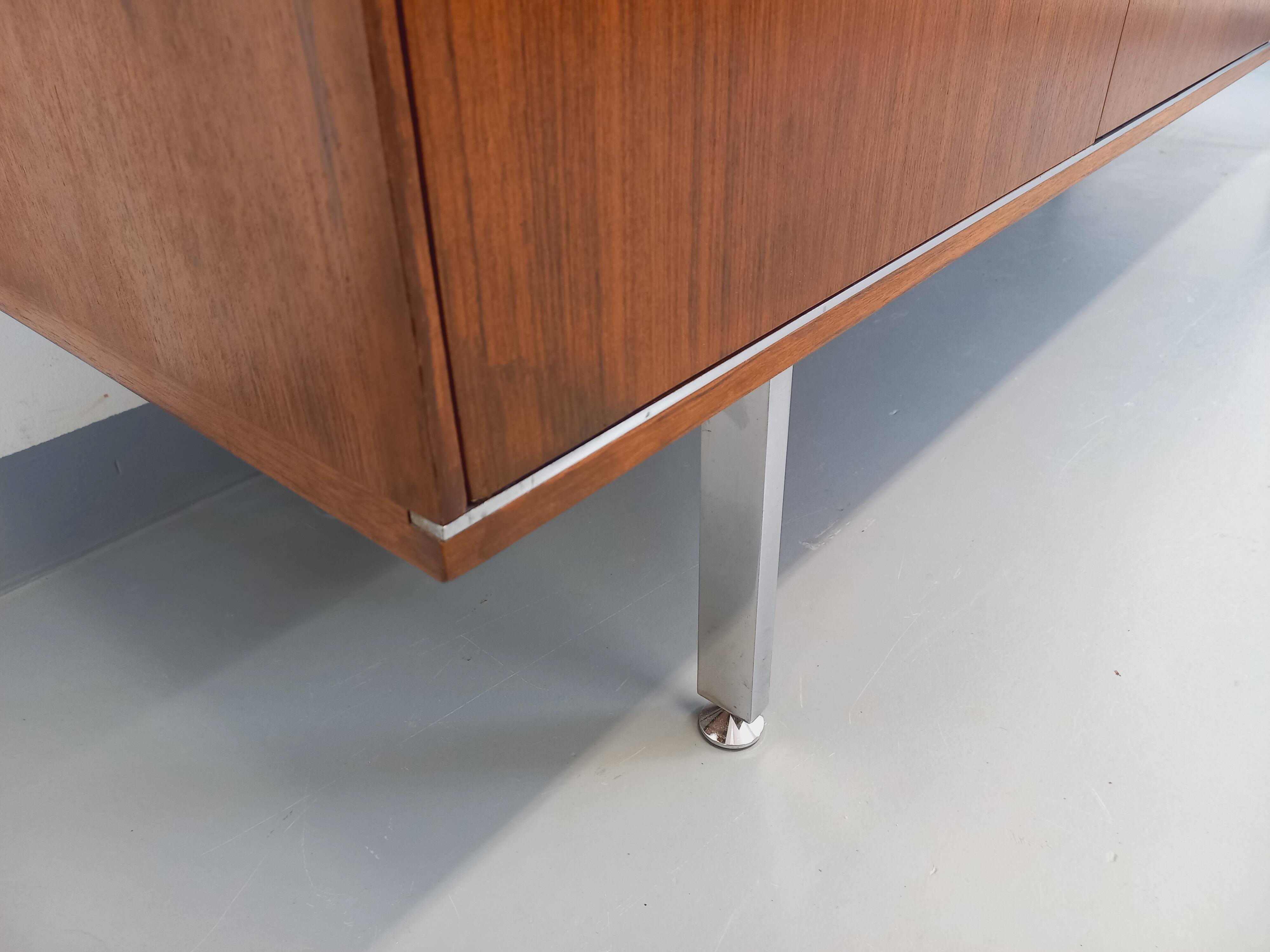 Vintage modernist enfilade in rosewood and chrome metal from the 60s and 70s.