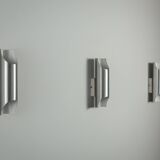 Set of three aluminium cylindrical wall lamps