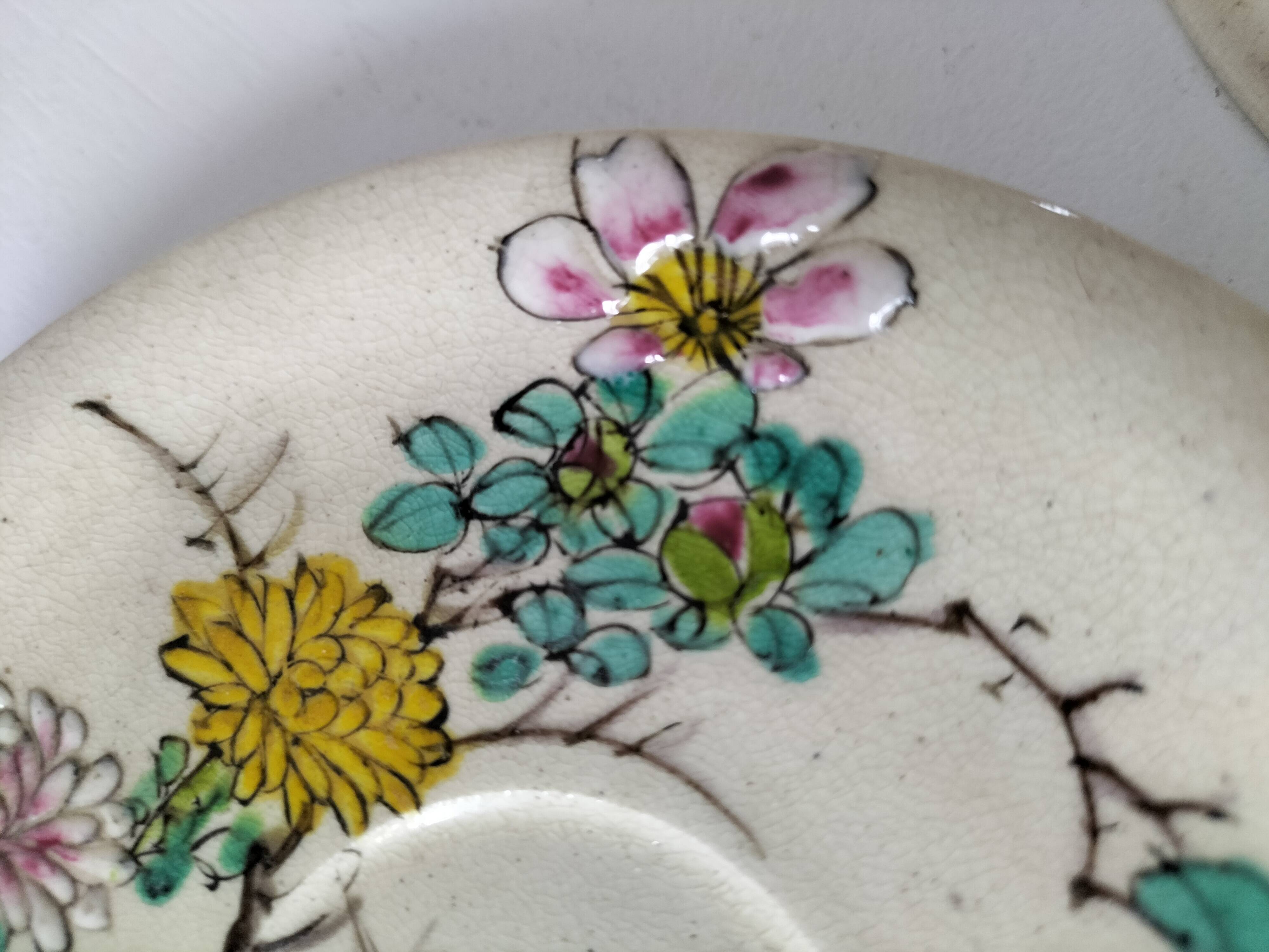 Japanese-style tea set in cracked earthenware with chrysanthemum flowers