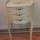 Pair of bedside tables louis XV style XX th century, painted floral decoration