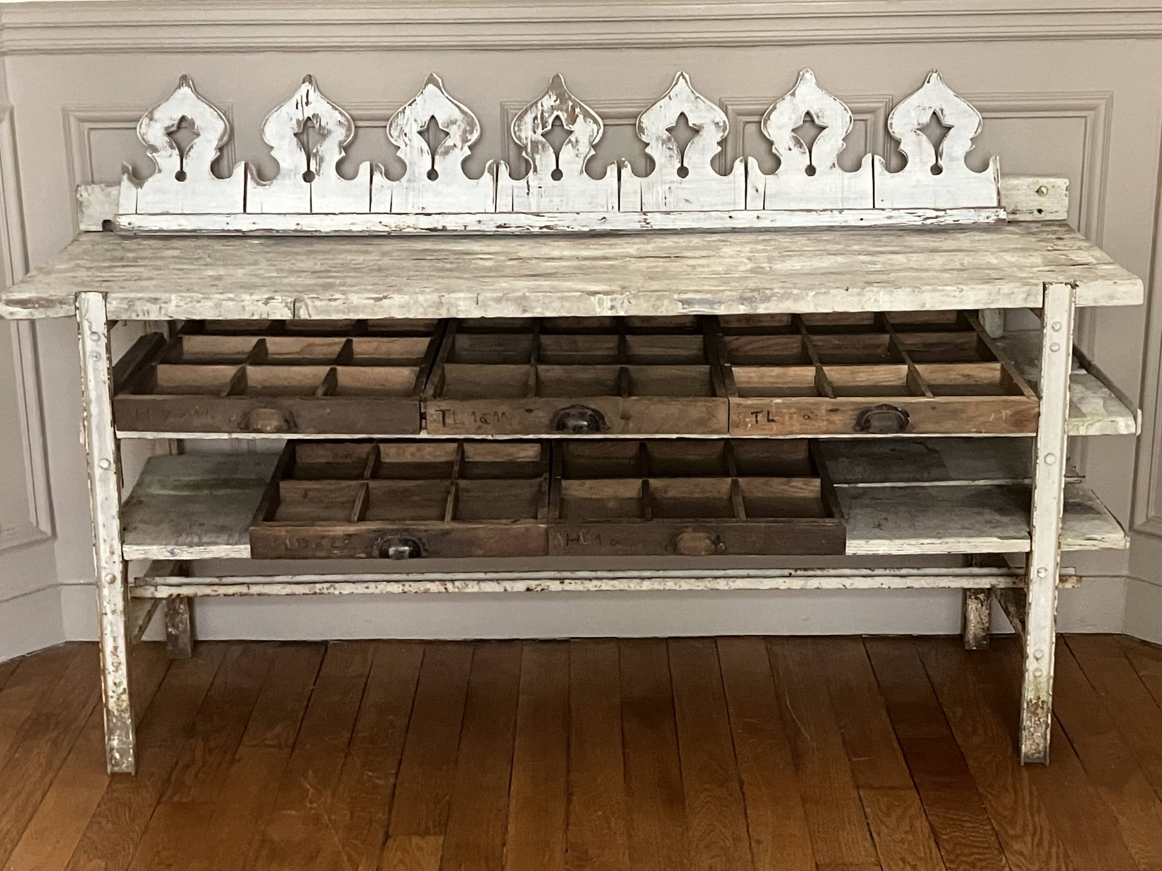 Old workbench, a piece of wooden and metal furniture.