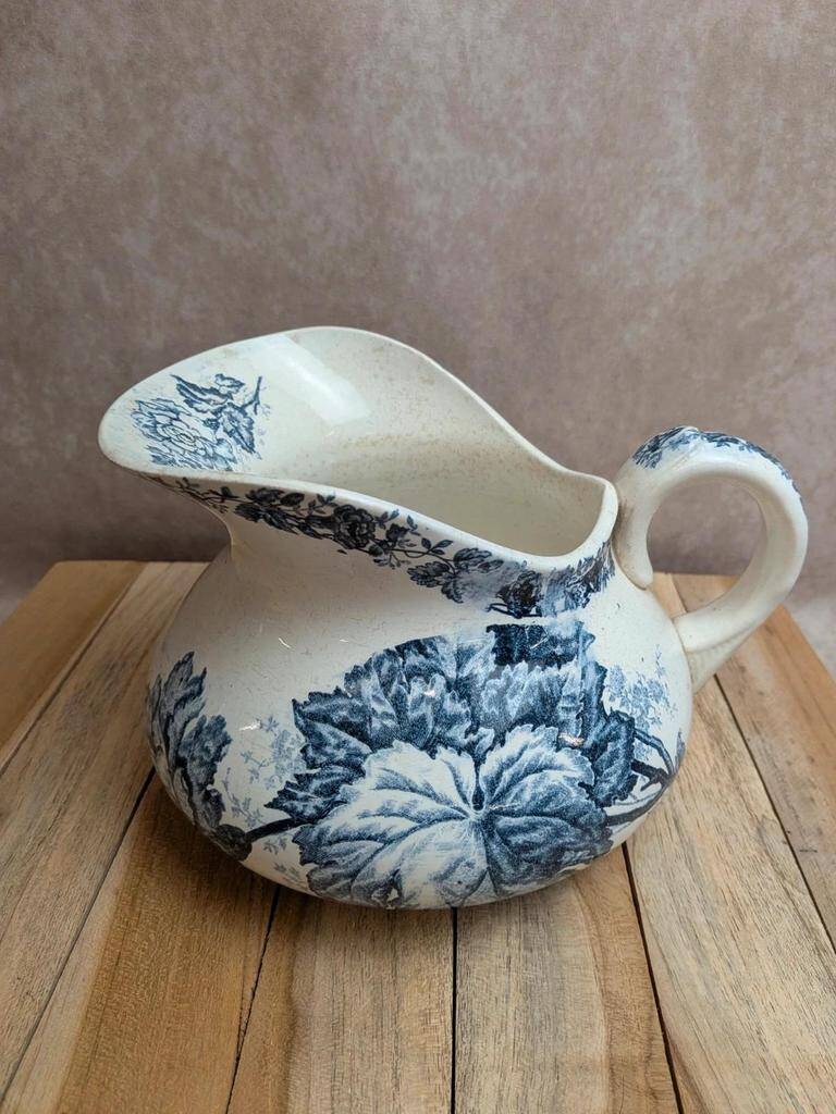 Small chubby antique jug in ironstone – blue floral decoration