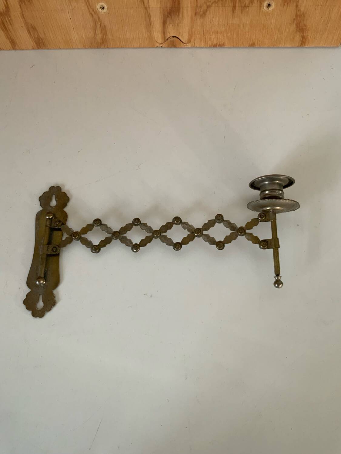 Old accordion candle holder