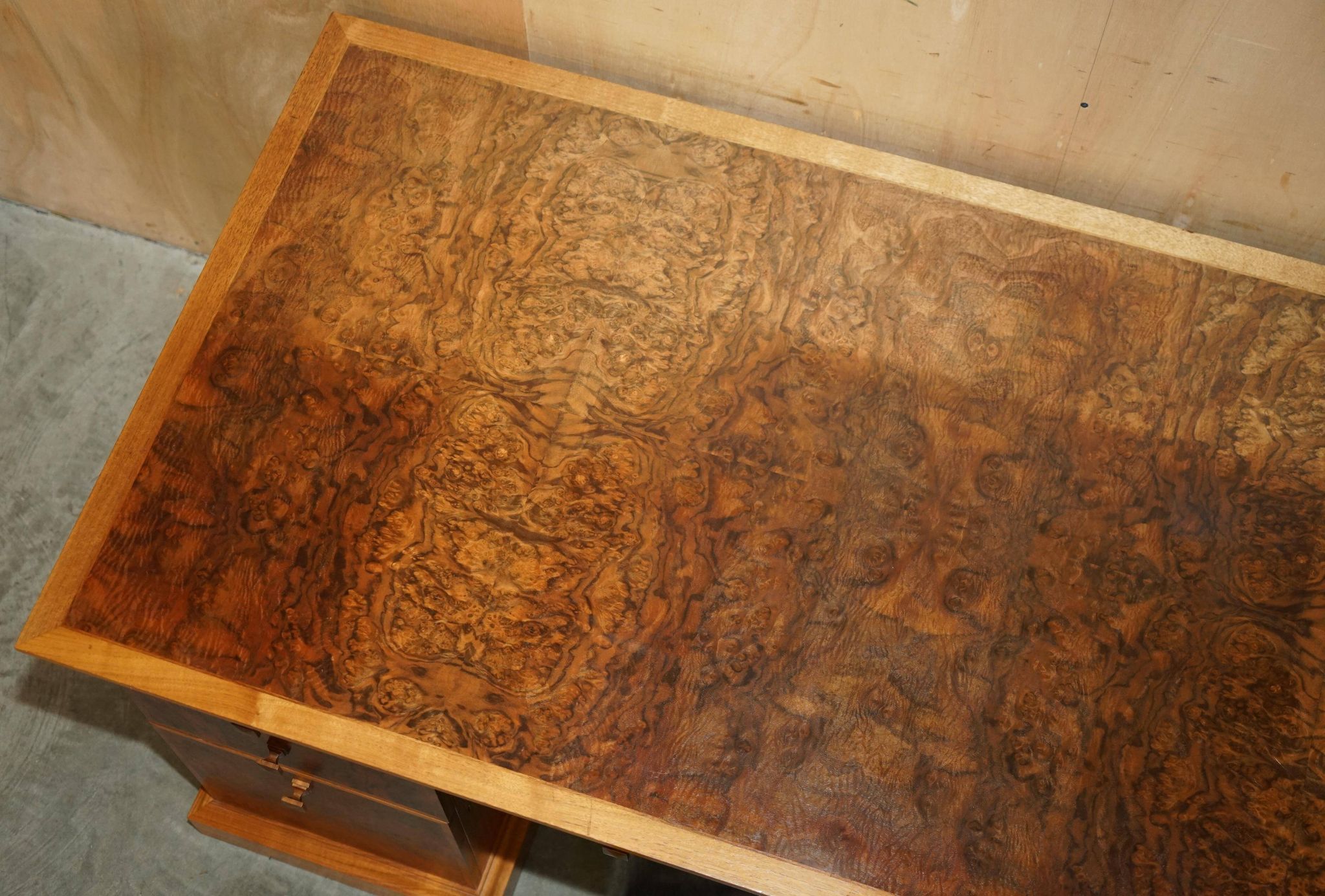 David Linley Burr walnut chest of drawers for light restoration.