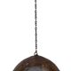 Metal hanging with its original rust colour