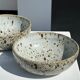 Duo of speckled ceramic bowls