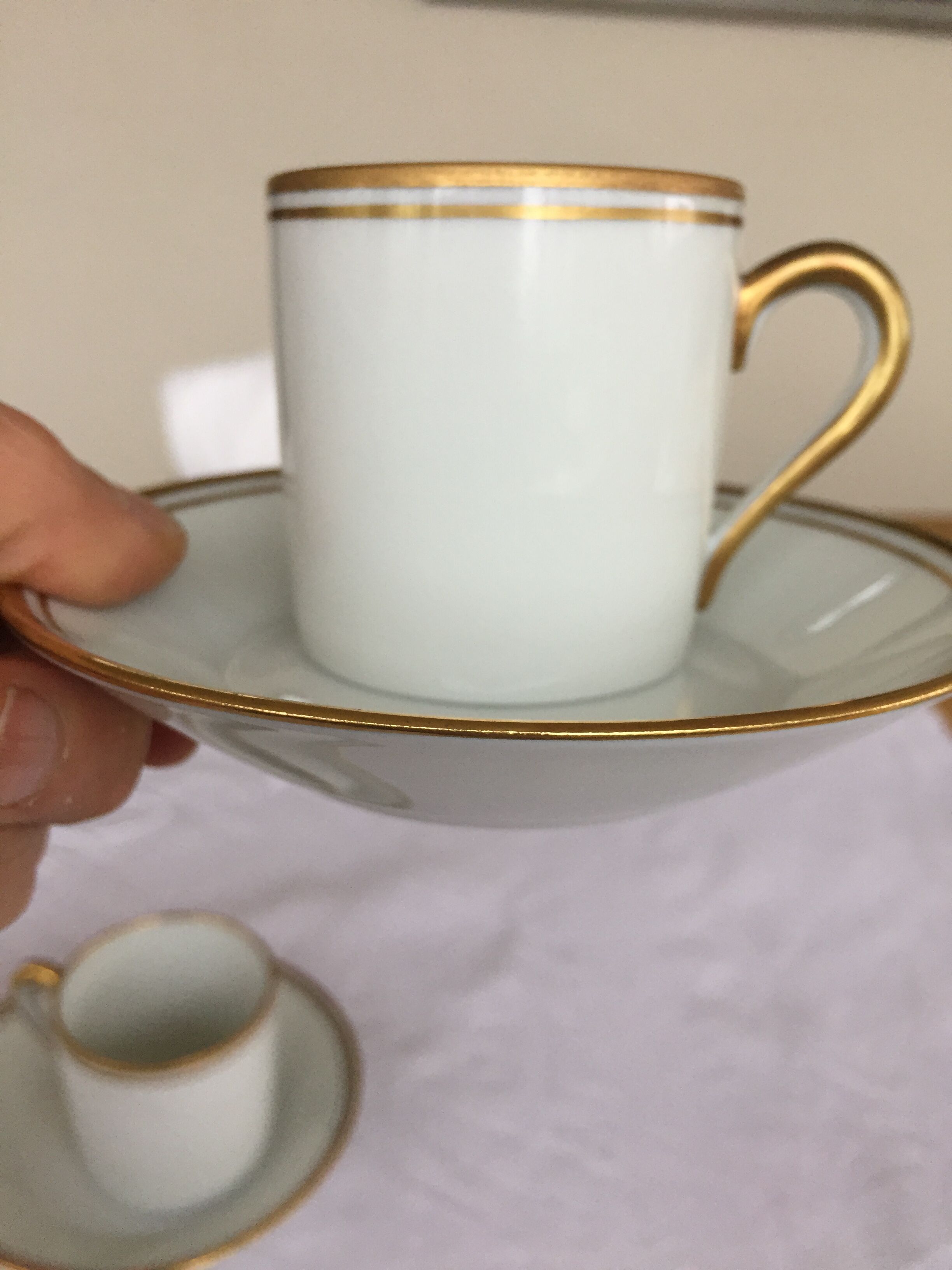 3 cups and their limoges porcelain undercup