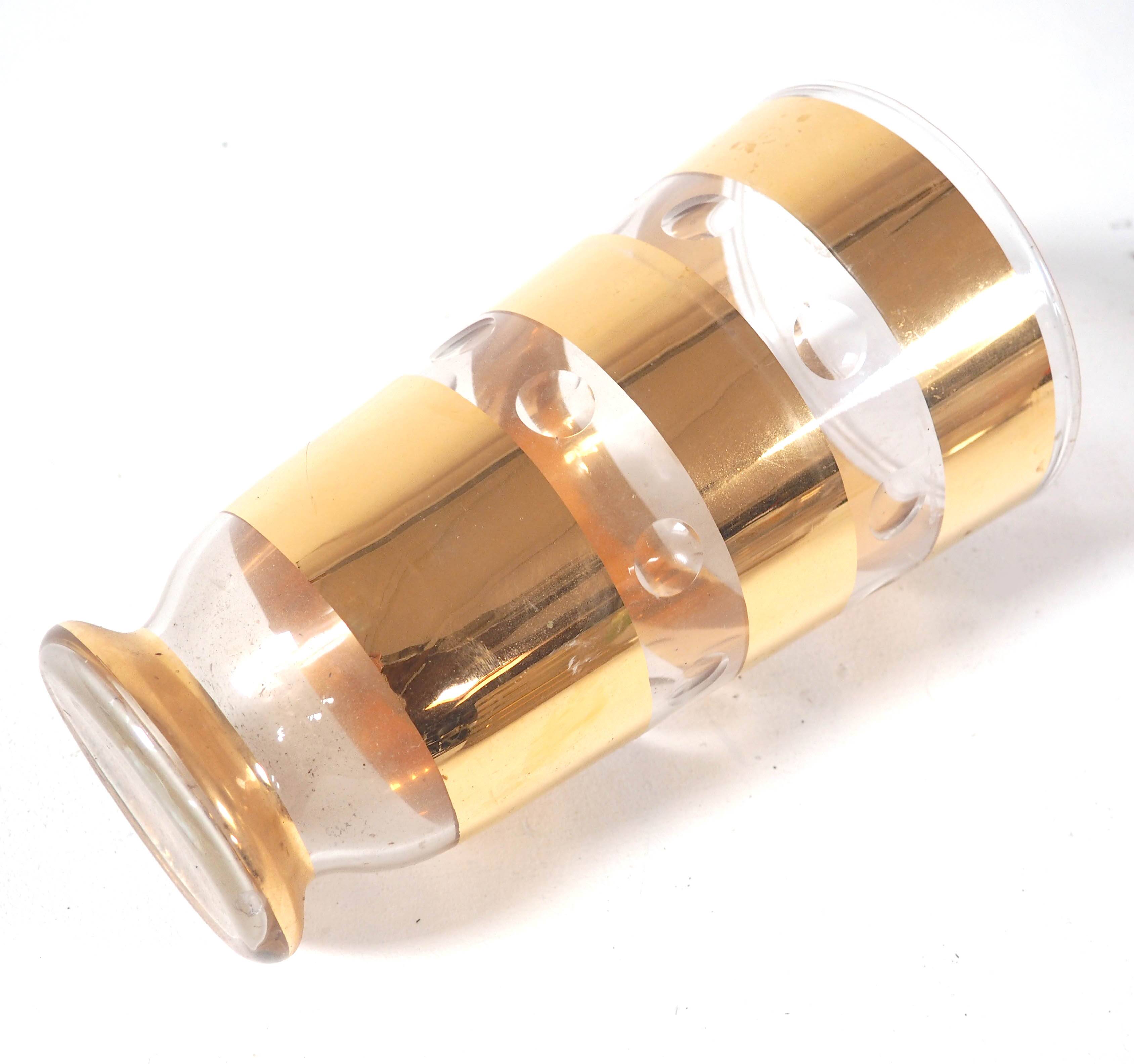 Glass vase with gold stripes