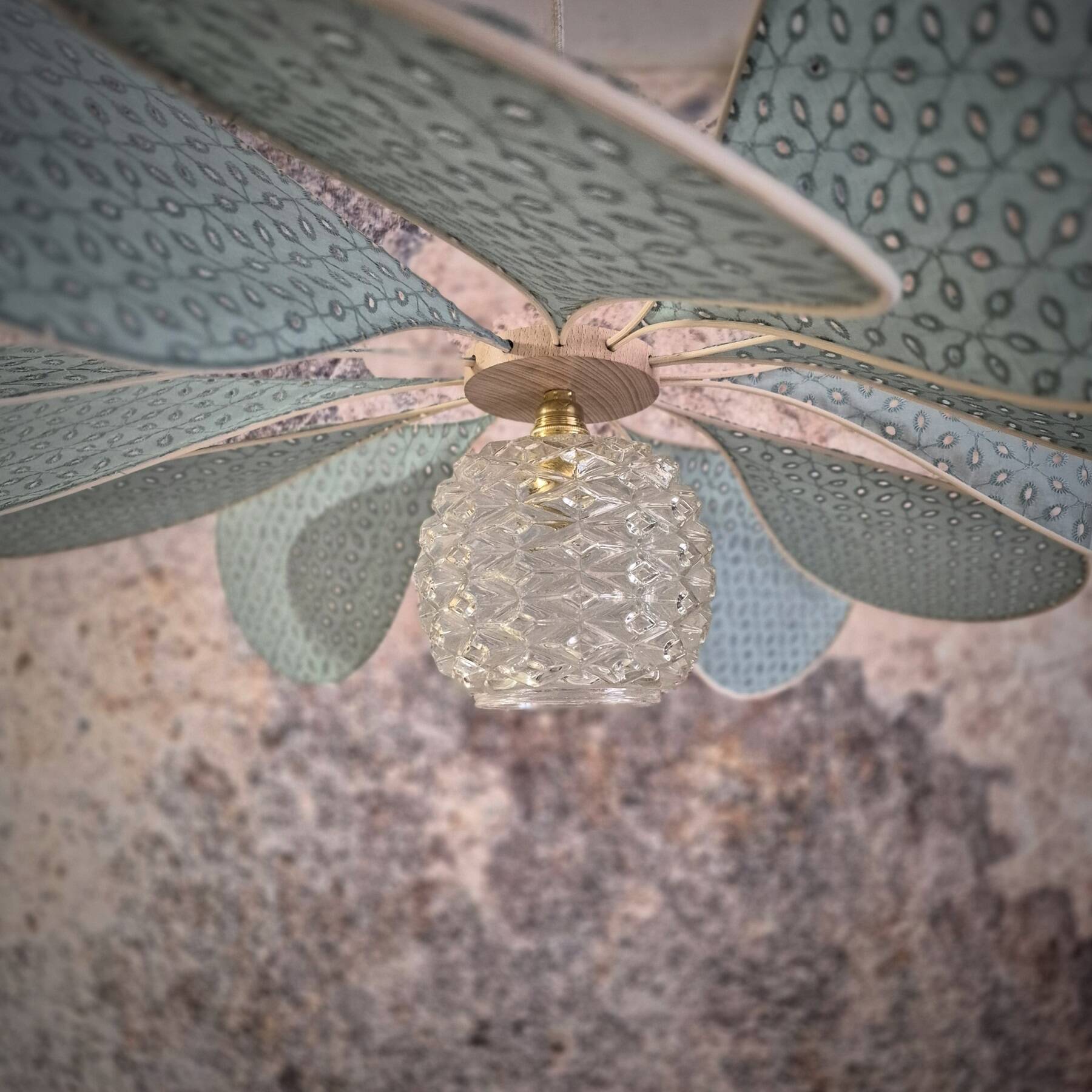 12-petal rattan and sage embroidery pendant light + vintage globe