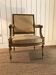 Fauteuil Louis XVI en bois doré sculpté et mouluré