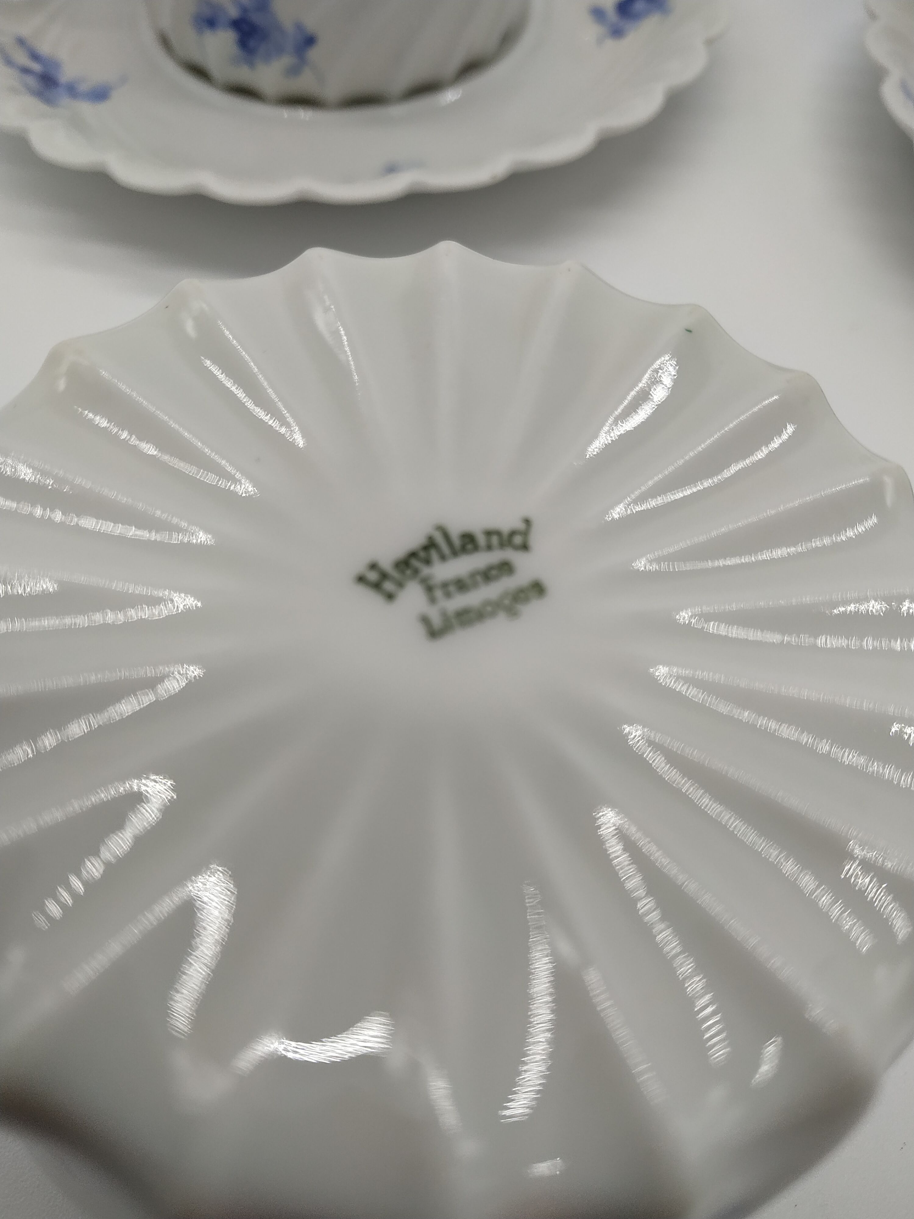 Haviland cup duo and its Limoges porcelain sugar bowl
