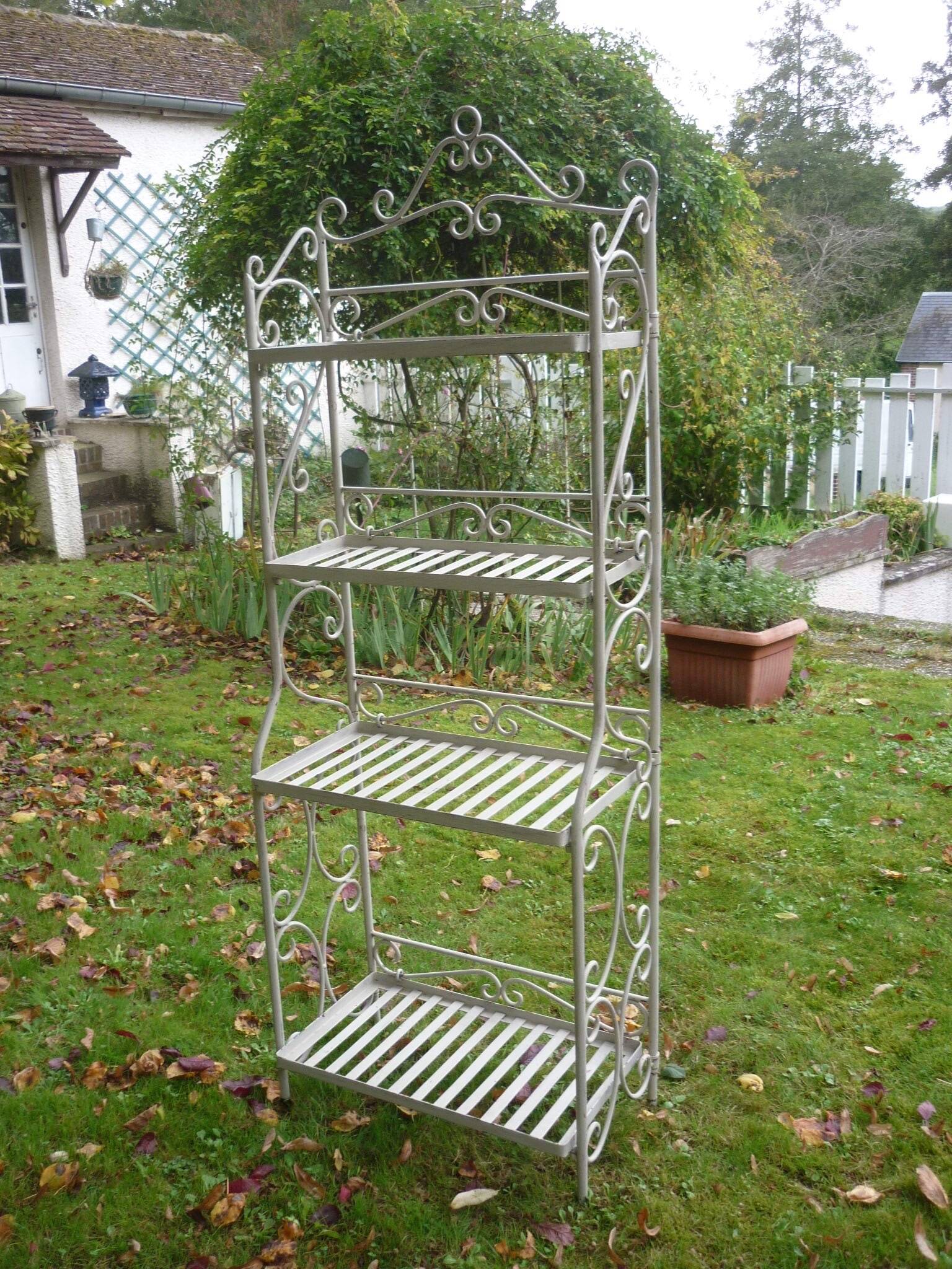 White wrought iron folding shelf