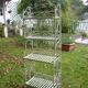 White wrought iron folding shelf