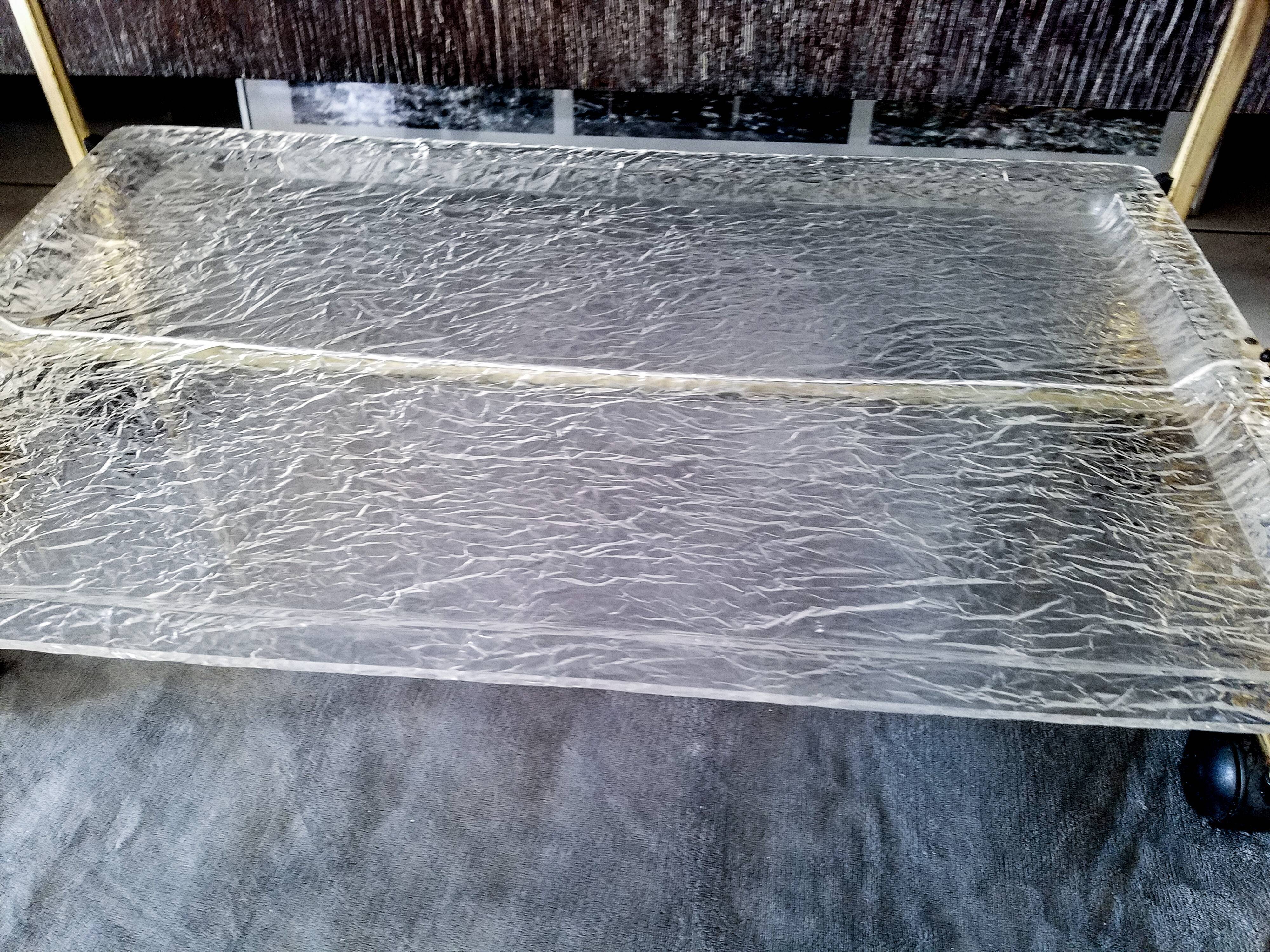 Gold-plated aluminum and structured lucite serving trolley circa 1970