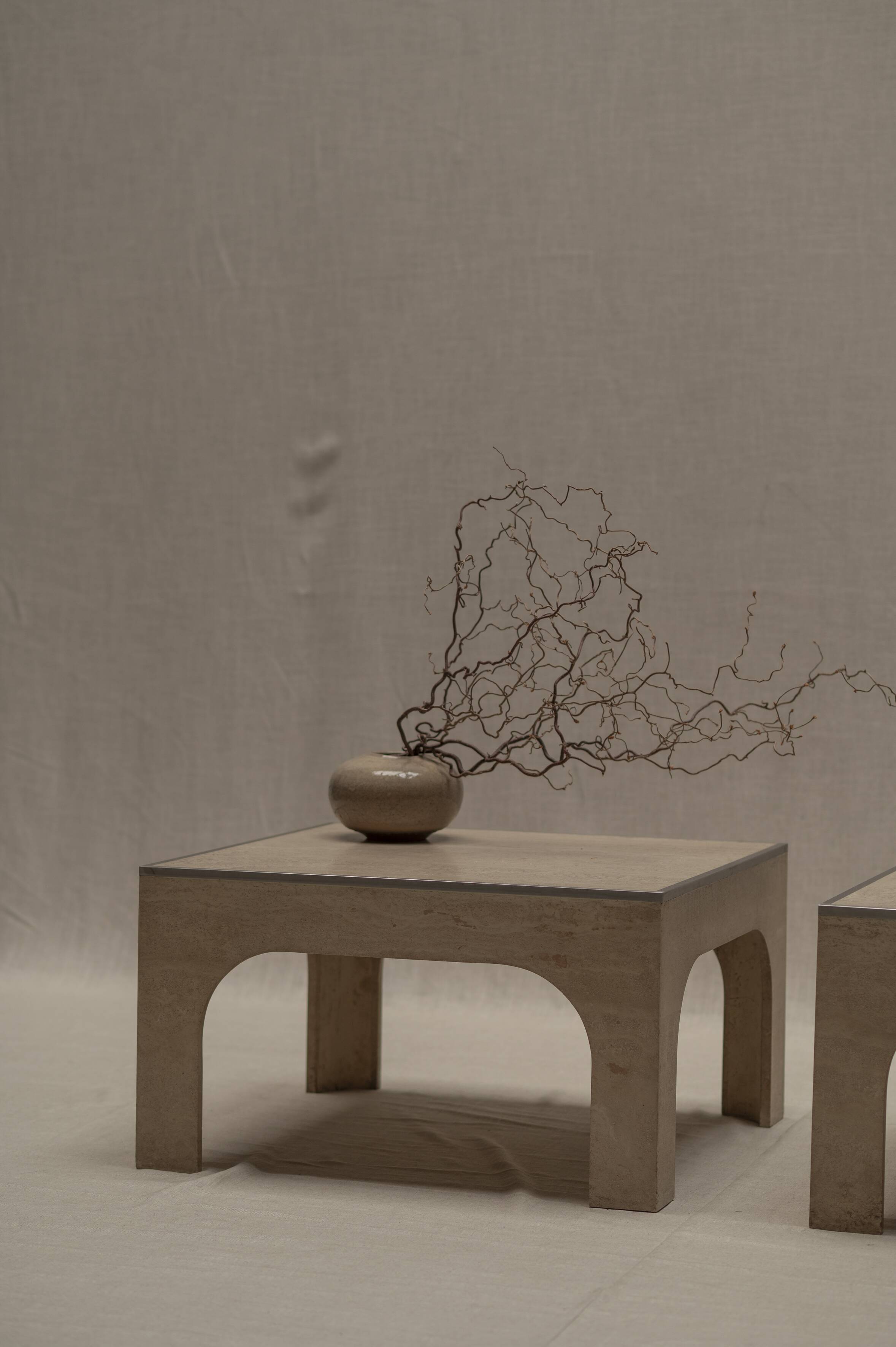 Architectural set of travertine coffee tables