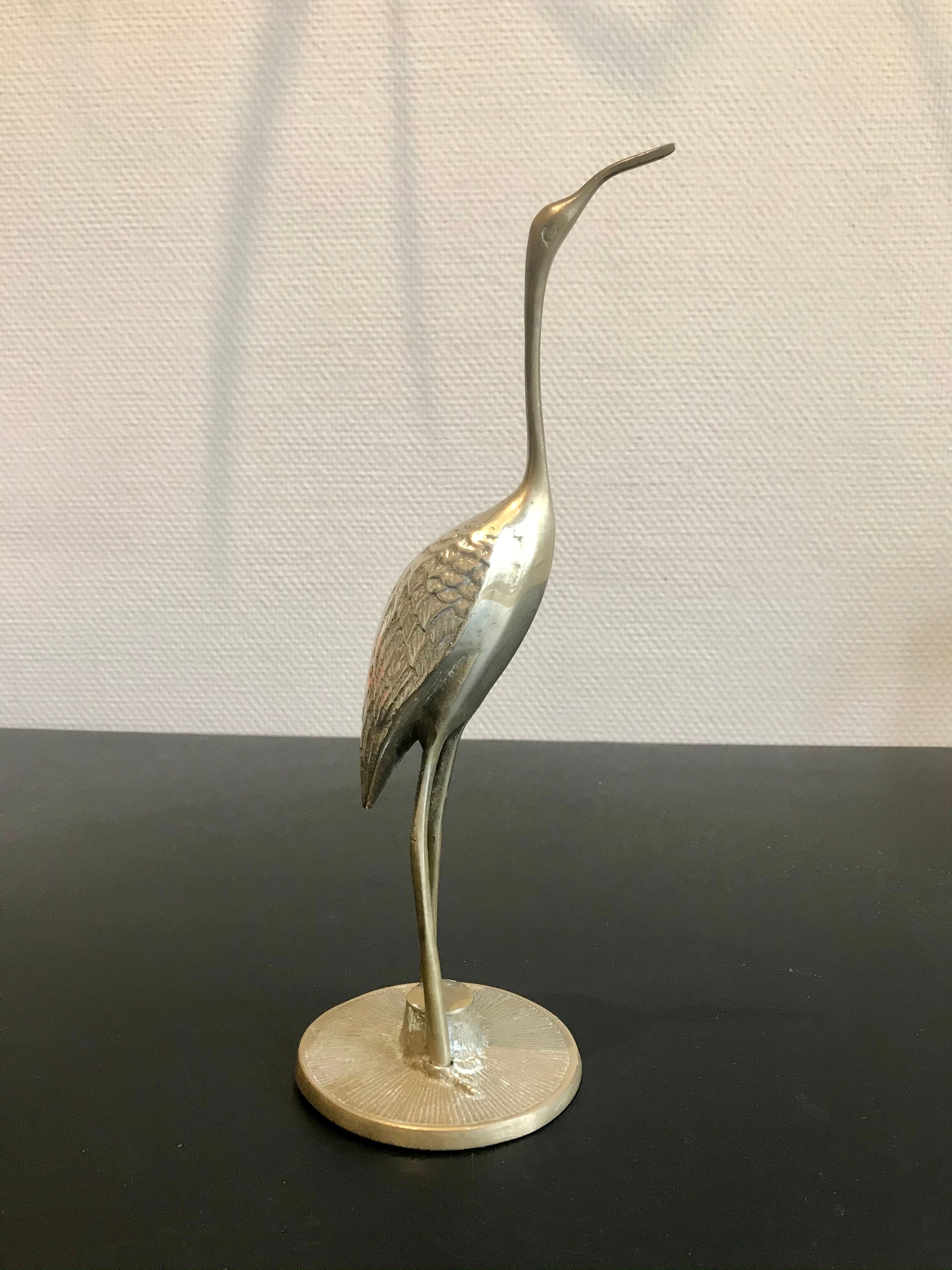Couple of brass birds