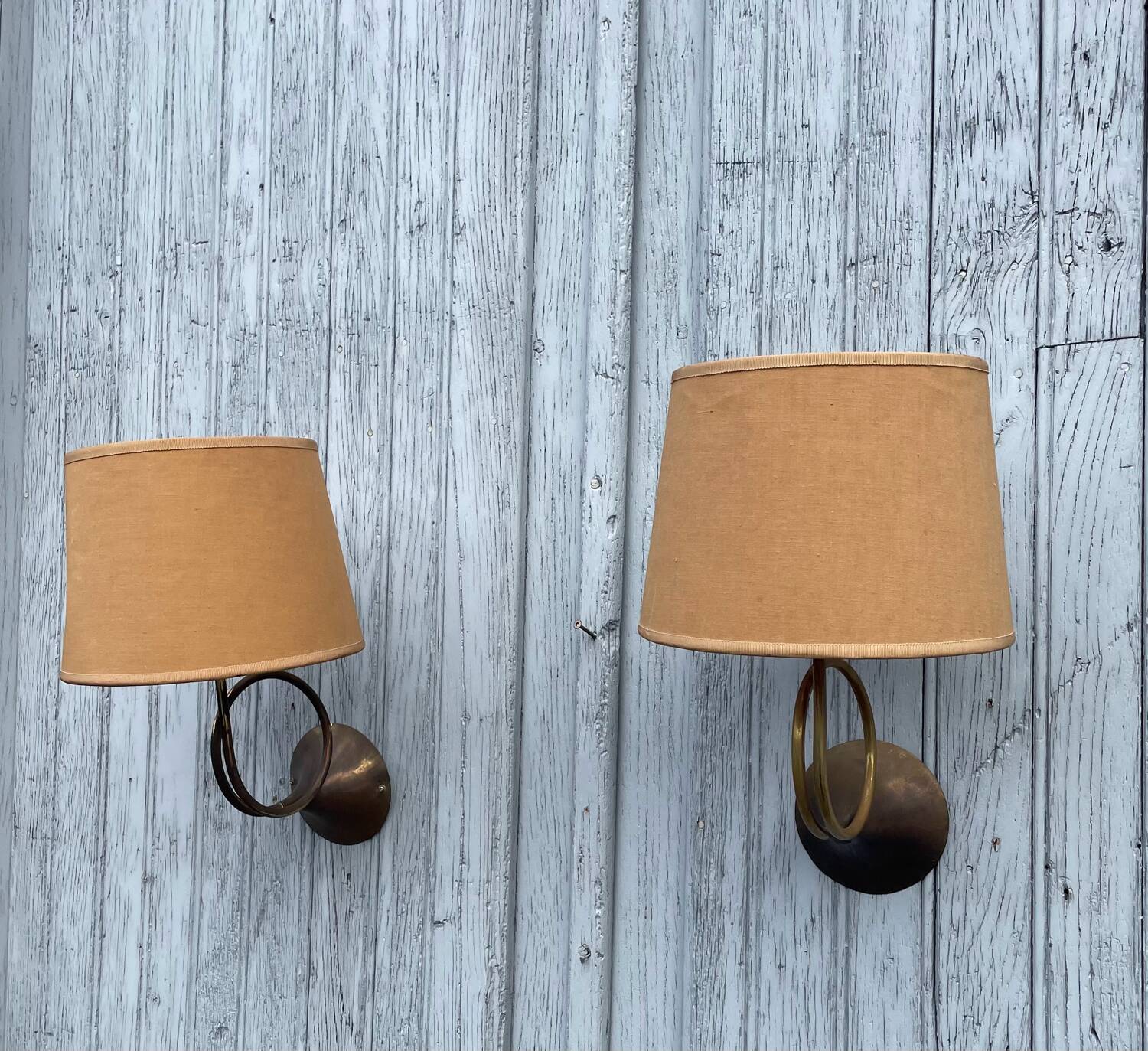 Two cornet-shaped wall lights