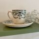 Tasse ancienne en terre de fer modèle guirlande de au planteur de caïffa