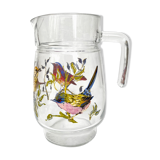 Vintage glass pitcher with birds