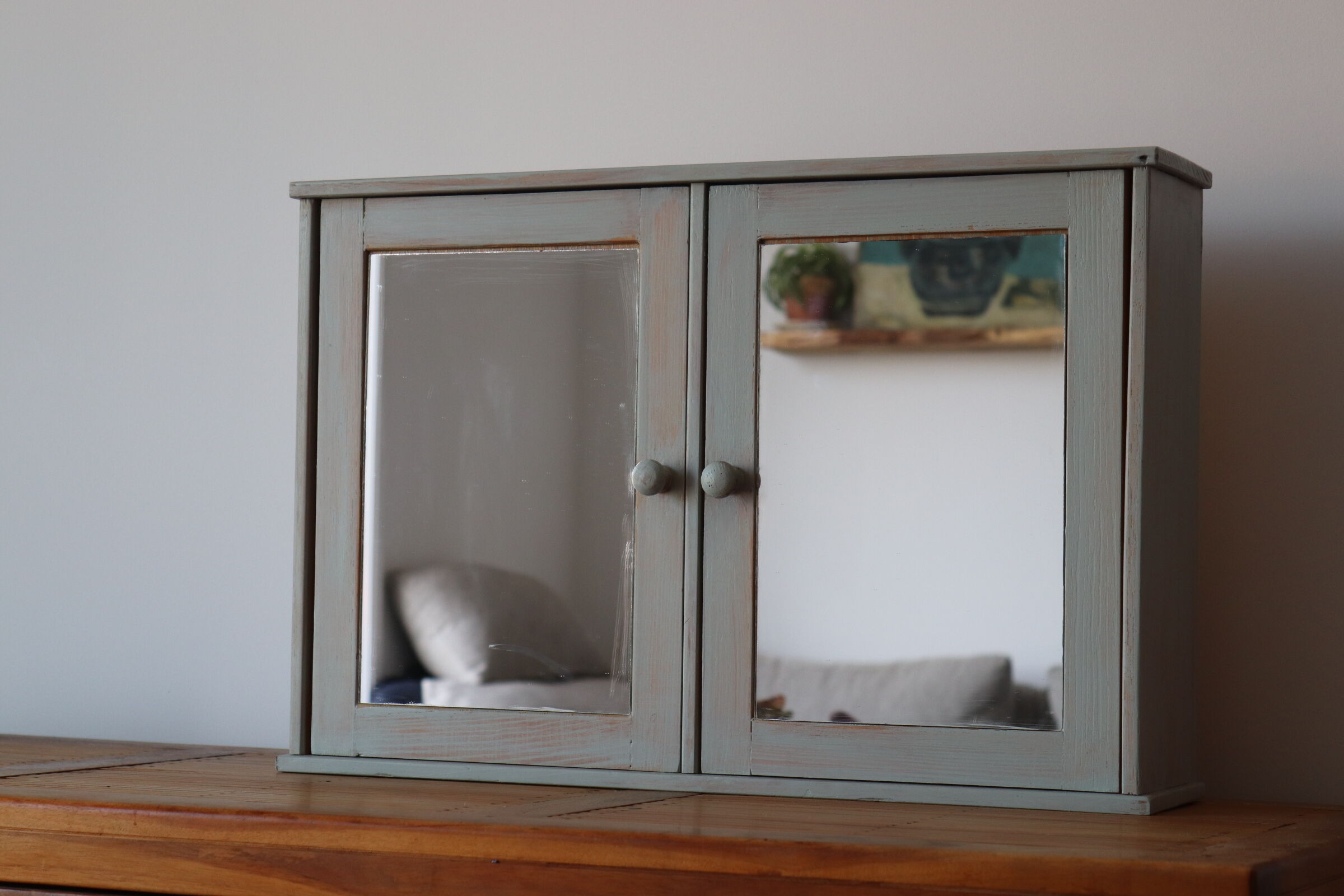 Greyed wood medicine cabinet