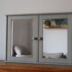 Greyed wood medicine cabinet