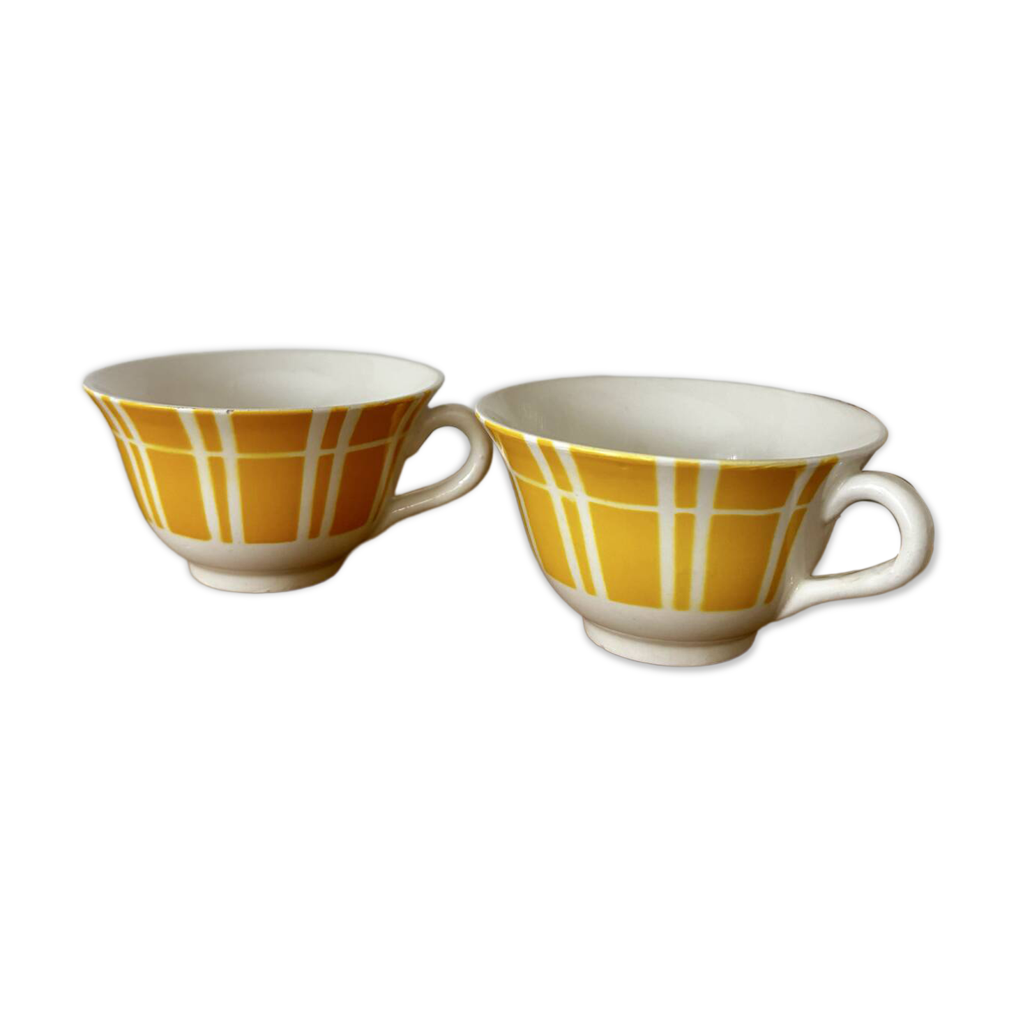 Set of two antique yellow Digoin Sarreguemines cups.