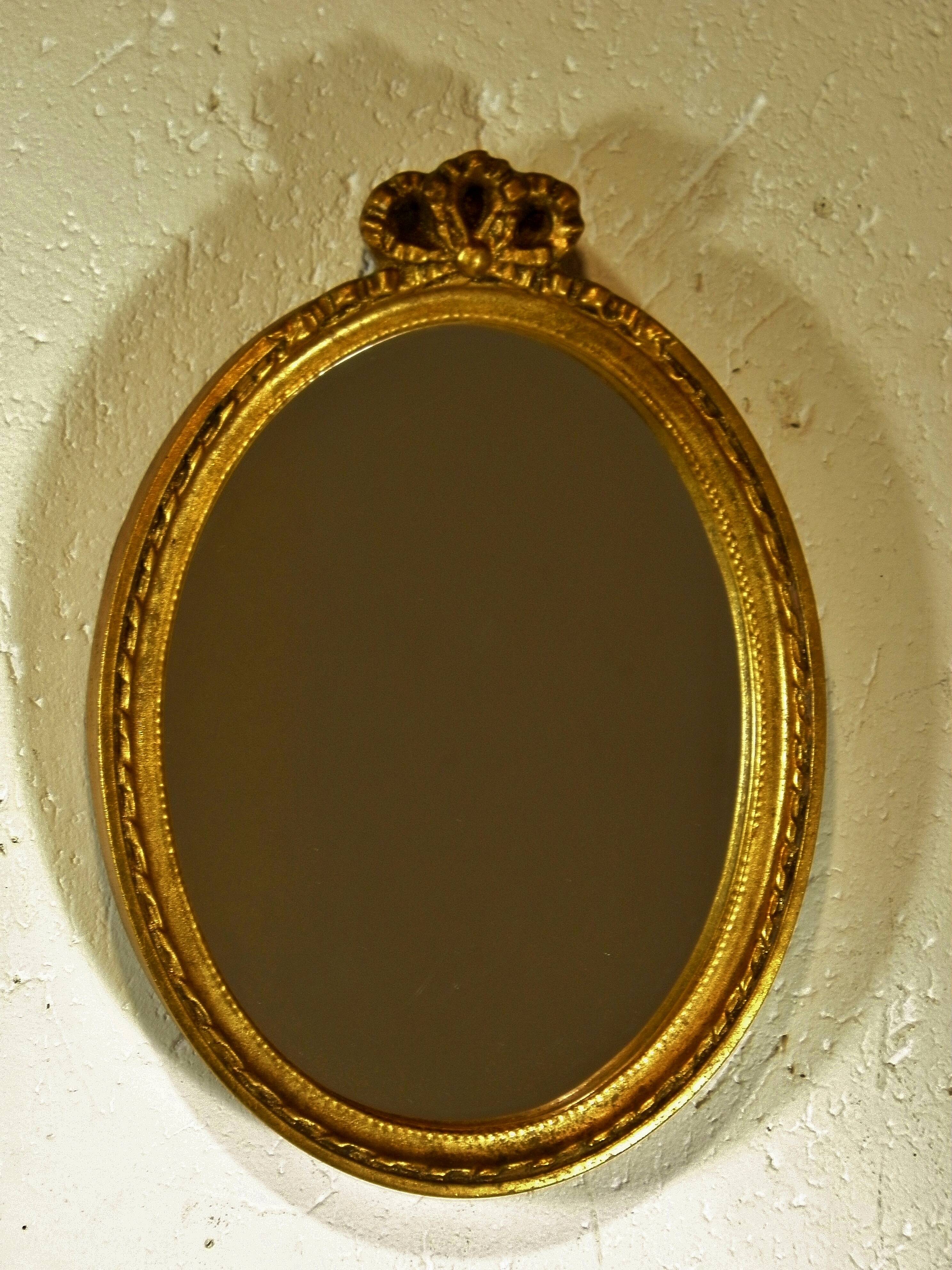 Oval mirror gold frame 28 x 20 cm