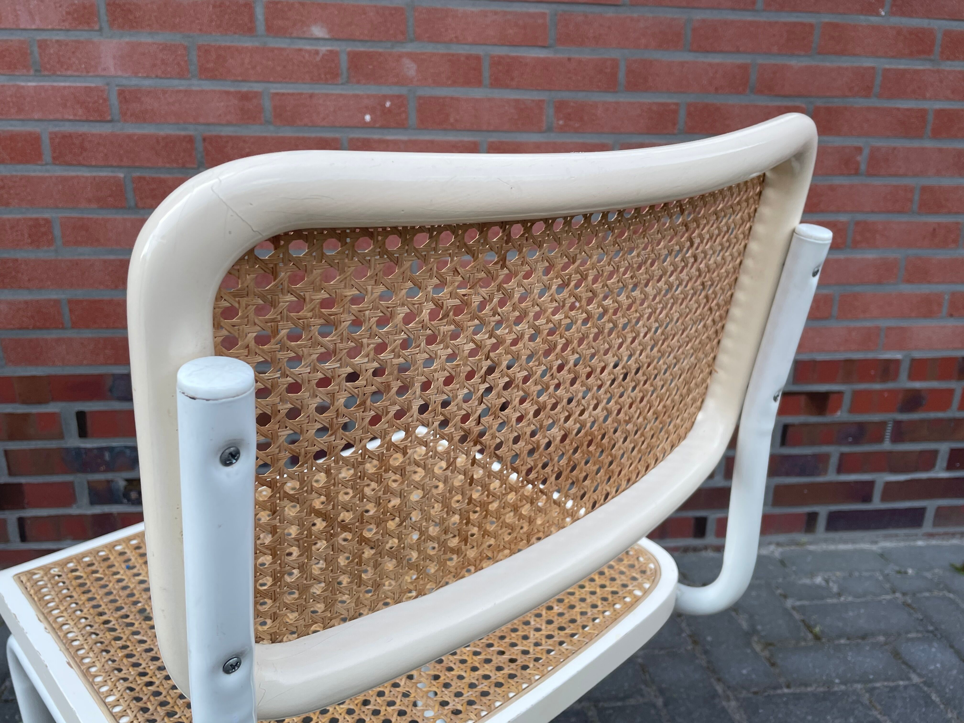 Cesca dining room chair designed by Marcel Breuer