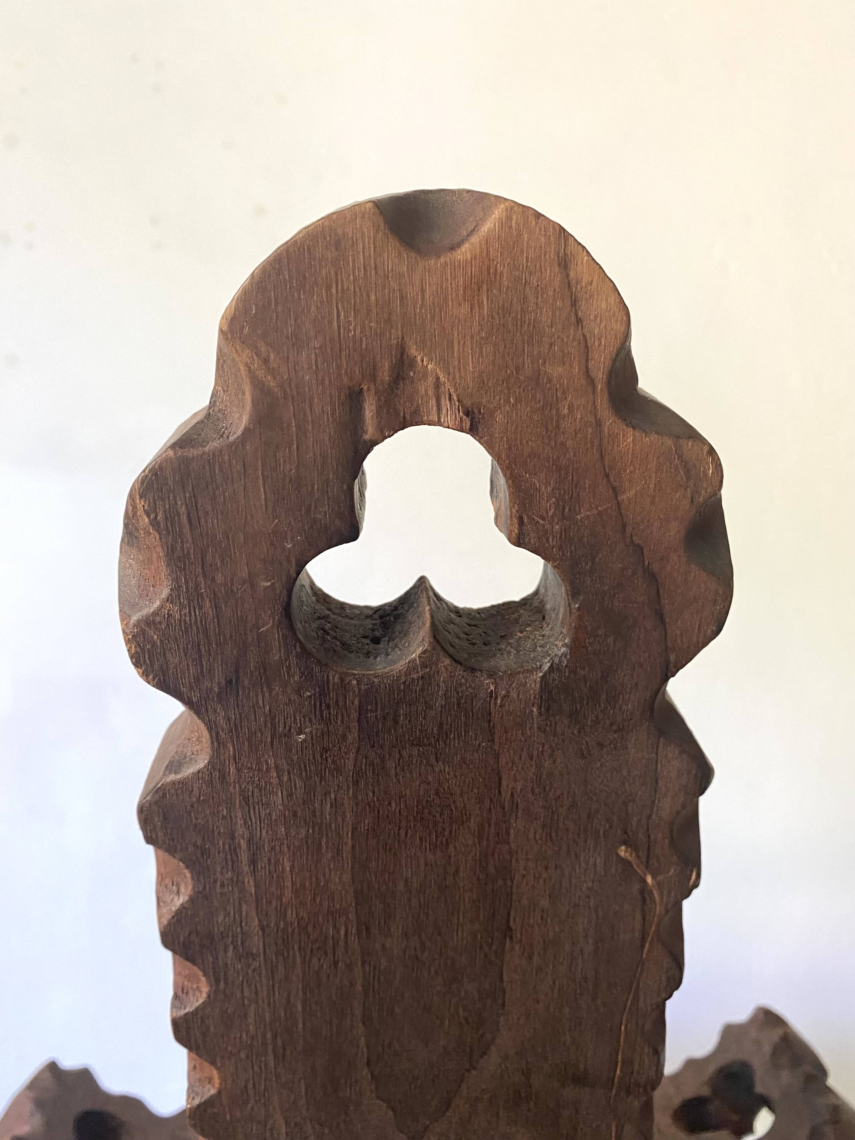 Vintage Spanish tripod chair in carved wood