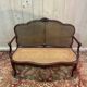 Louis XV mahogany and cane bench