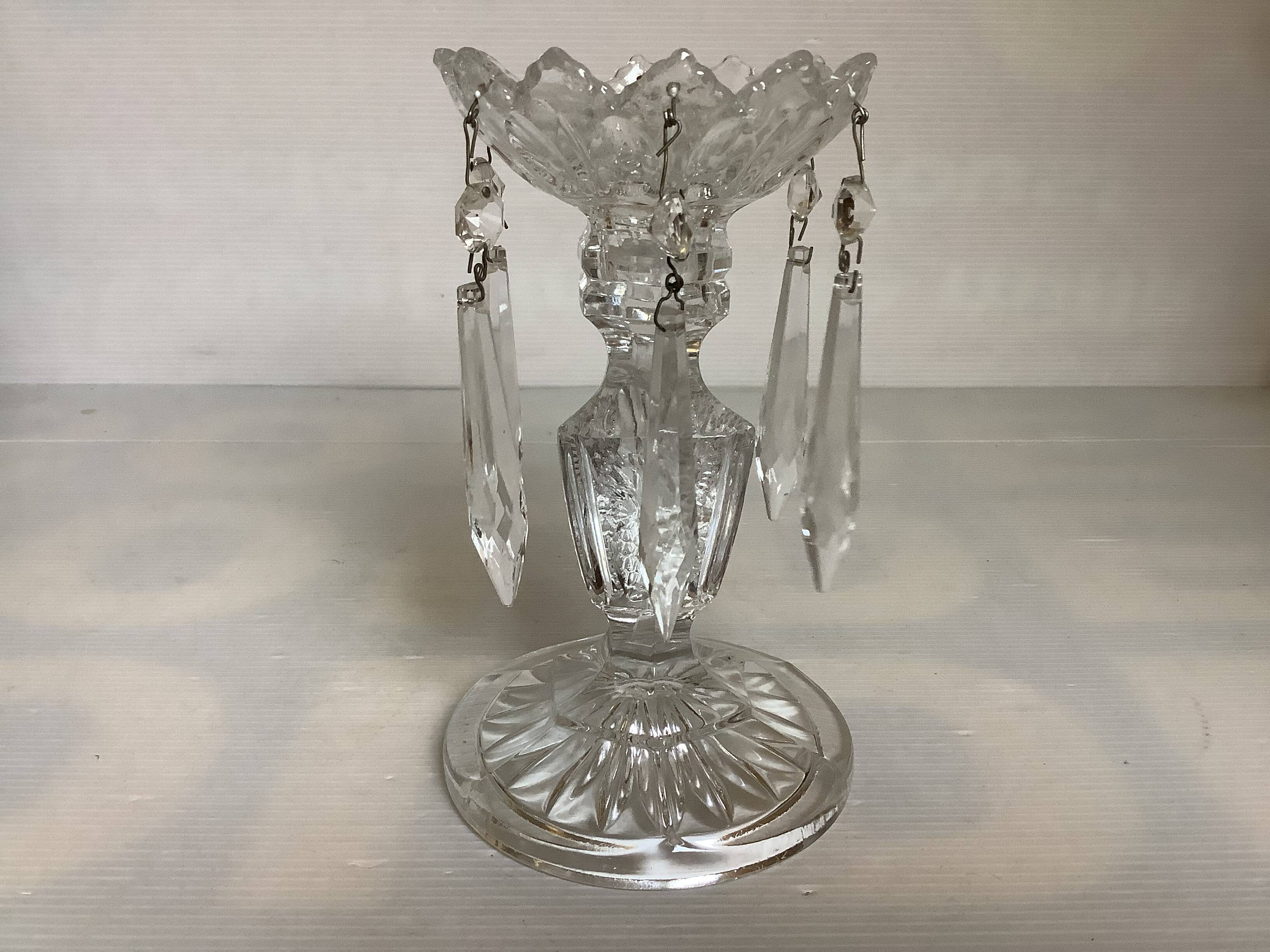 Pineapple candlestick with six glass moulded pendants.