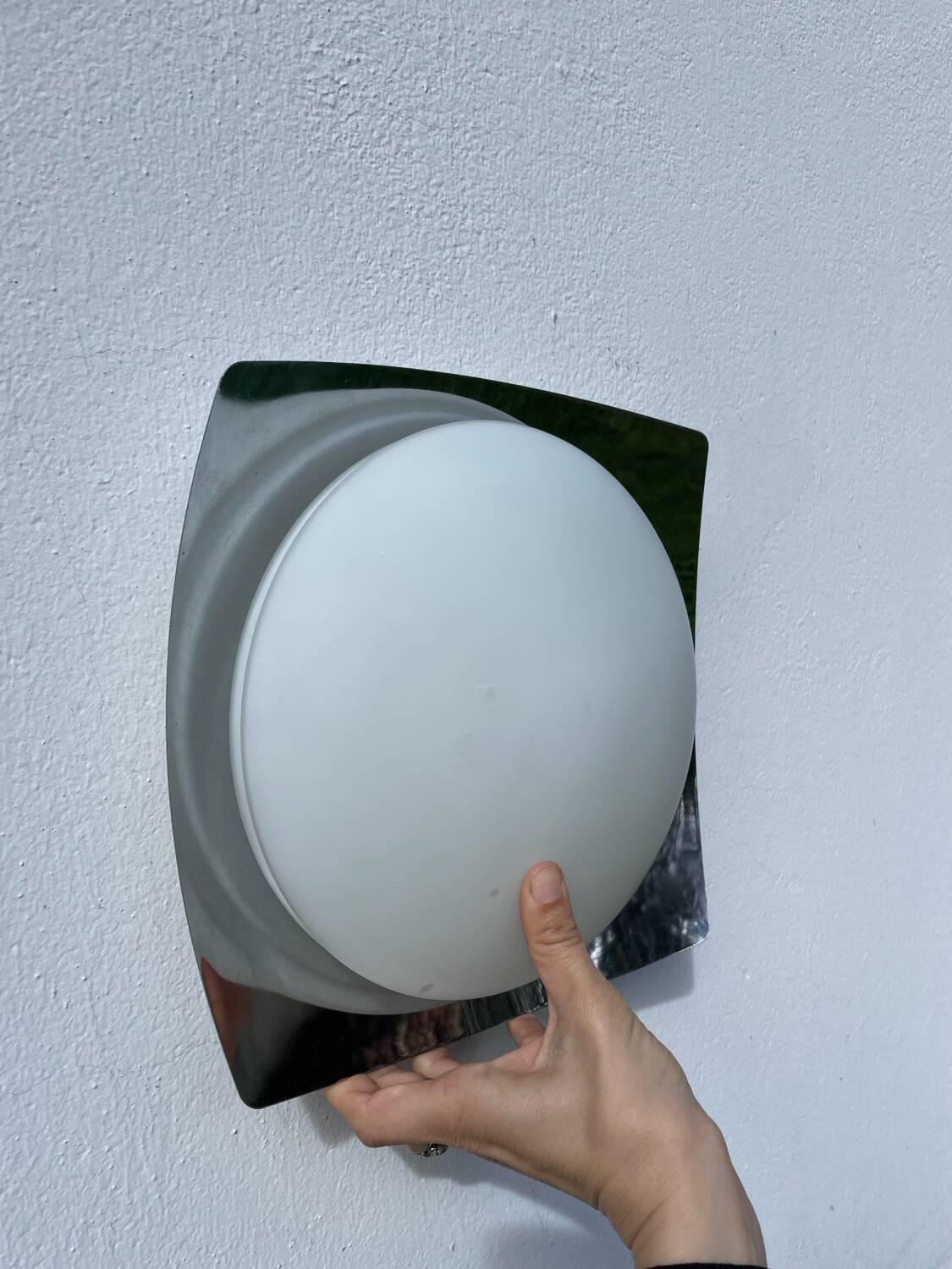 White glass and stainless steel ceiling light