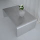 Table basse en aluminium brossé sculptural