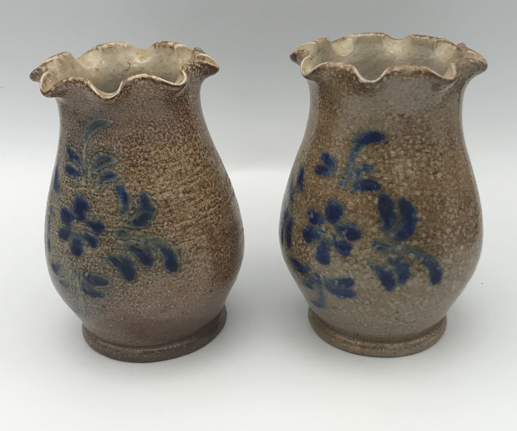 Pair of vintage pottery vases with floral decoration and glaçureau sel