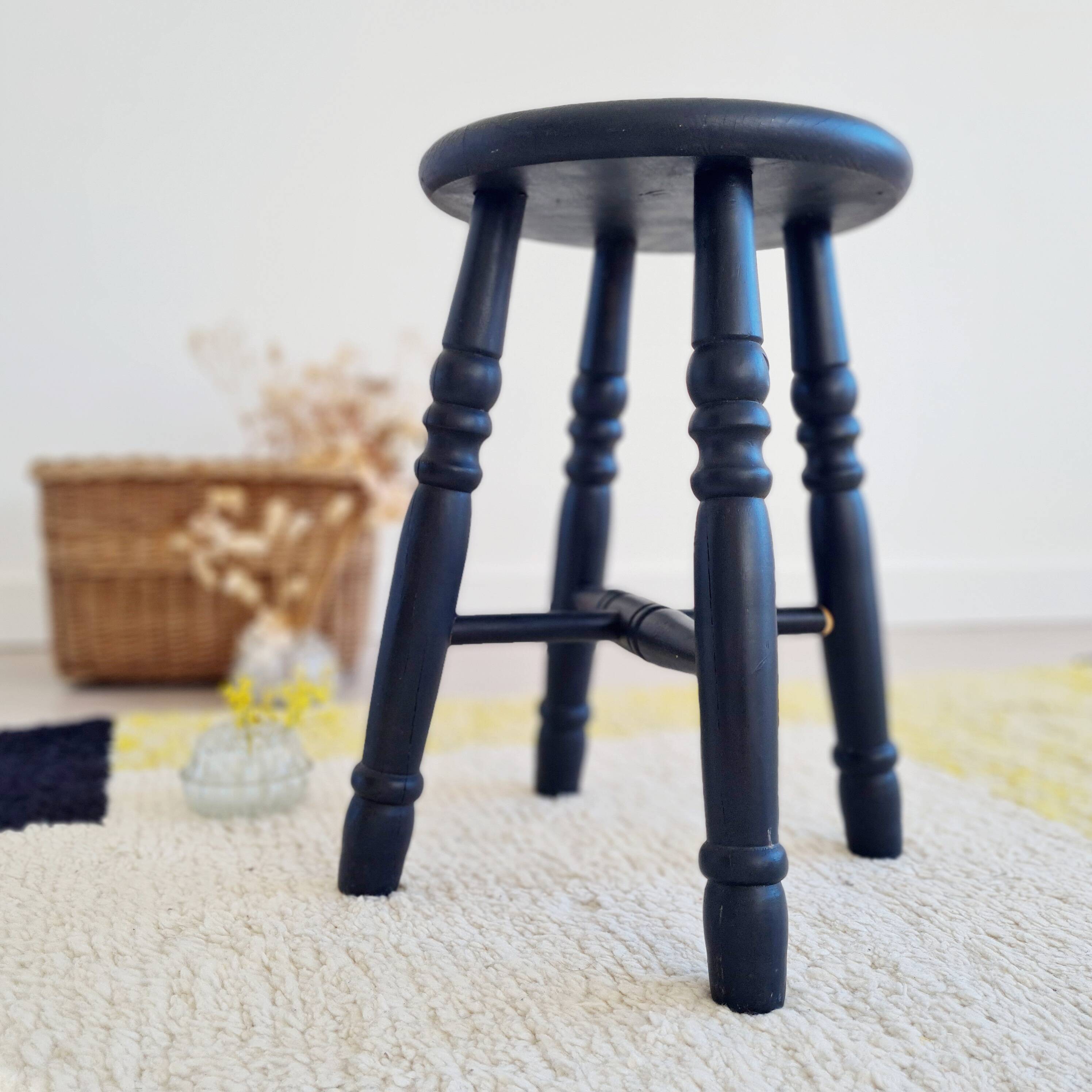 Antique black wooden stool, renovated
